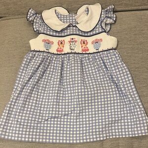 Blue Gingham Smocked Baby Dress with staffordshire dogs Motif